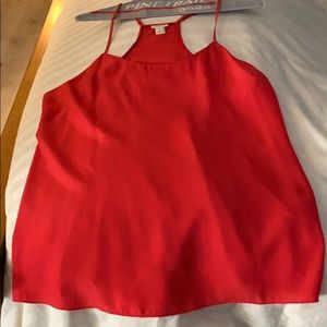 Red sleeveless blouse